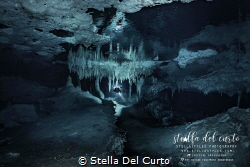 Reflections and lights in Nohoch Nah Chich cave by Stella Del Curto 